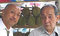 Shihan's with the durians:Smiling and/or puzzled?